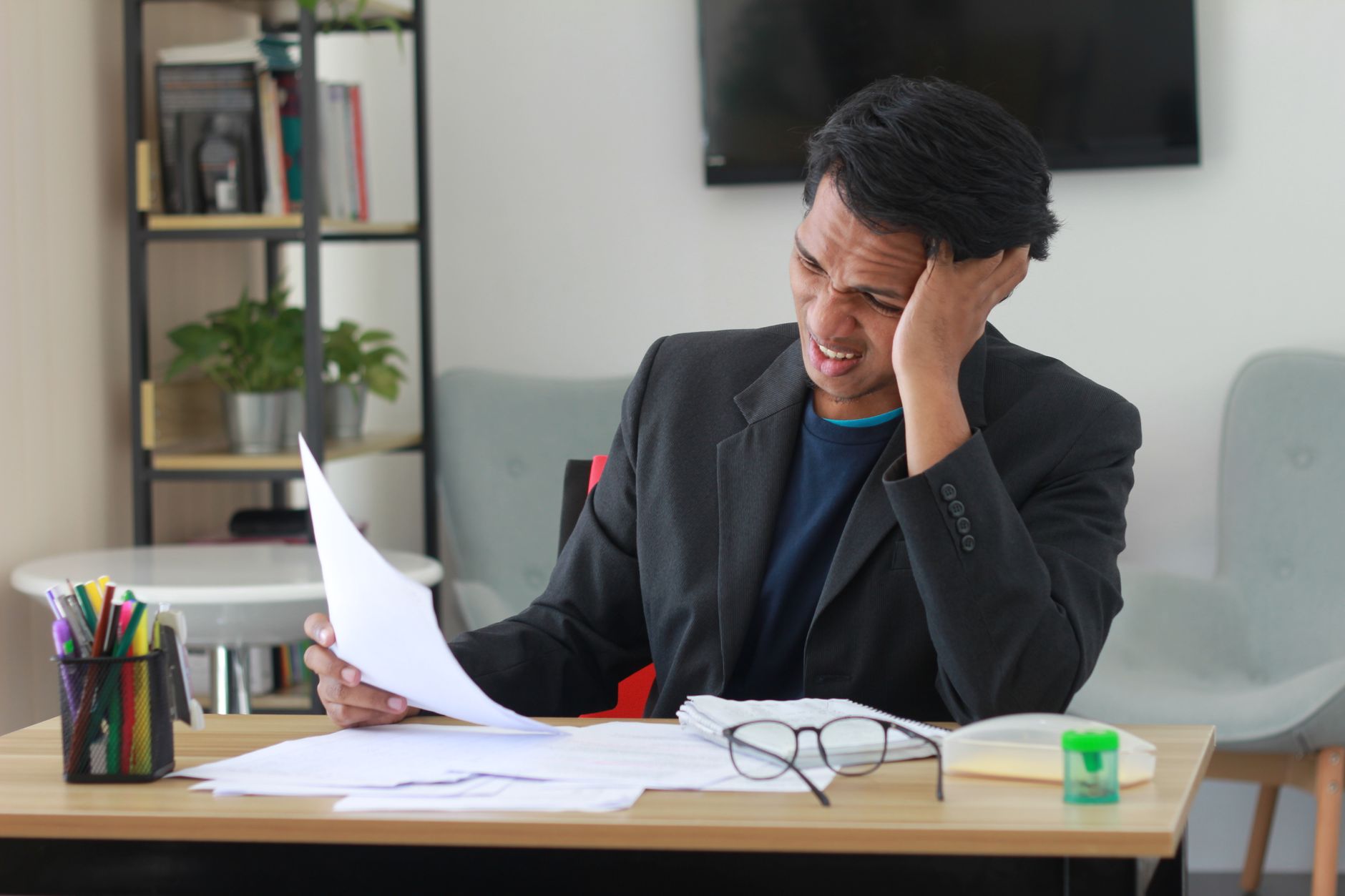 Business owner overwhelmed managing reviews across multiple platforms